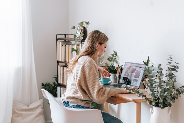 Young woman working on her laptop.