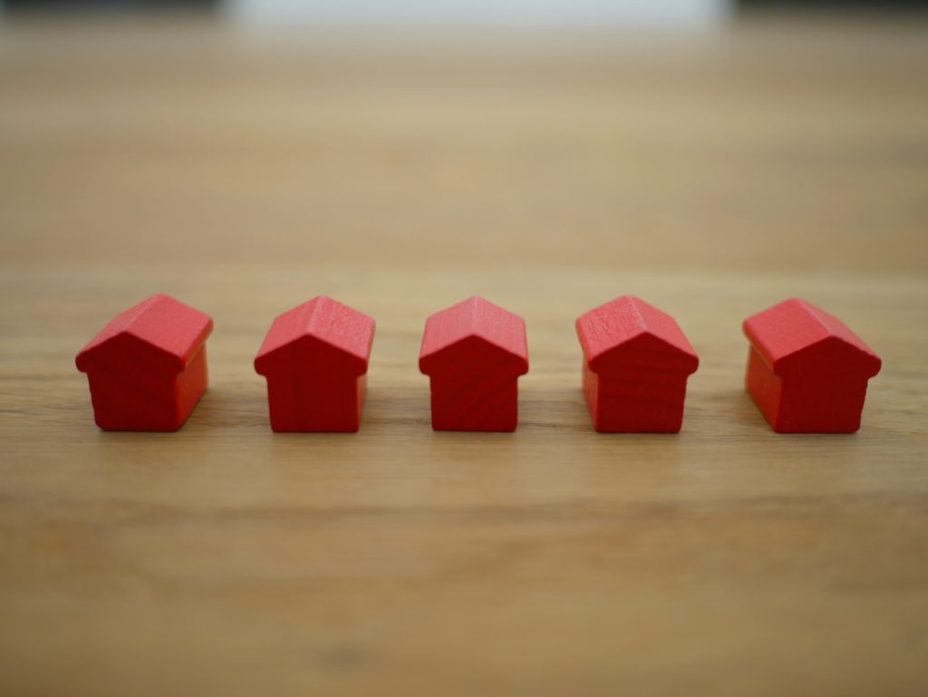 A row of red monopoly houses.